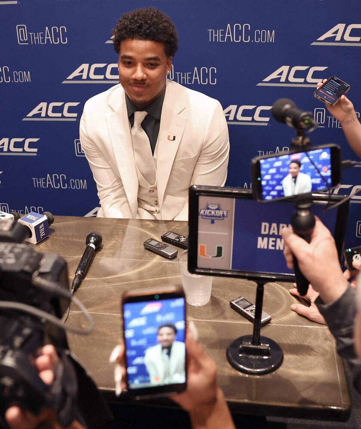 Miami Hurricanes quarterback Darian Mensah is smiles as he prepares to answer reporter’s questions during a breakout session at the 2026 ACC Football Kickoff program at the Hilton Charlotte Uptown Hotel in Charlotte, NC on Wednesday, July 15, 2026.